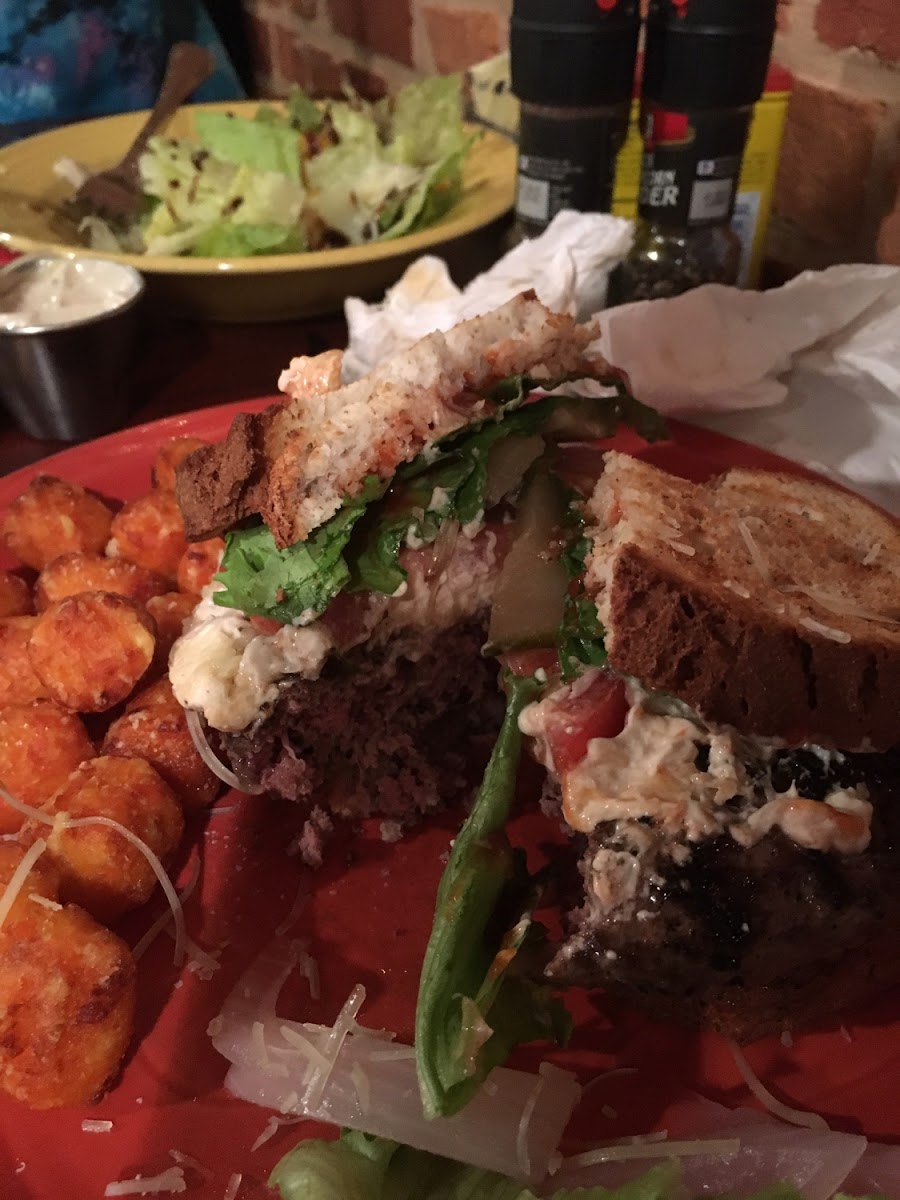 Burger with crab dip on toasted GF bread.