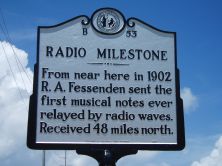 From near here in 1902 R. A. Fessenden sent the first musical notes ever relayed by radio waves. Received 48 miles north.Plaque via North Carolina Highway Historical Marker Program, and is used...