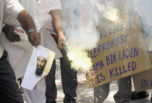 The death of al-Qaeda leader Osama bin Laden is celebrated in Ahmedabad, India. For the first time the voices of his wife and children have been heard