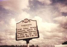 Indian community prior to Tuscarora War. In 1712 destroyed by forces under Col. John Barnwell. Site 3 mi. N.E.Plaque via North Carolina Highway Historical Marker Program, and is used with their...