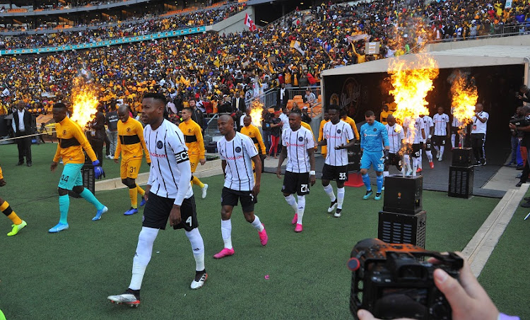 General view teams of walking on the pitch during the Carling Black Label Cup Match between Kaizer Chiefs and Orlando Pirates on the 27 July 2019 at FNB Stadium, Soweto.