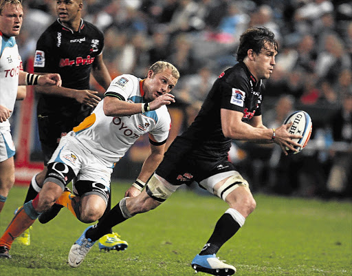 Sharks captain Keegan Daniel makes a break in a match against the Cheetahs. His skill at offloading and creating linebreaks will be crucial if the Sharks are to beat the Chiefs Picture: STEVE HAAG/GALLO IMAGES
