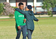 Banyana Banyana coach Desiree Ellis (R) looking in good spirits with defender Bambanani Mbane (L) during South Africa training session on September 10 2018 at Nelson Mandela Metropolitan University in Port Elizabeth.     