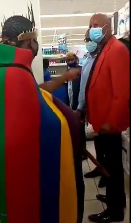 Cultural activist Thando Mahlangu can be seen in this picture being told to leave the mall due to his traditional attire.