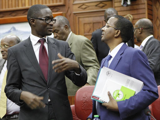 Outgoing IEBC chairman Issack Hassan and CEO Ezra Chiloba when the commissioners appeared before the Select Committee on the IEBC on August 1 /MONICAH MWANGI