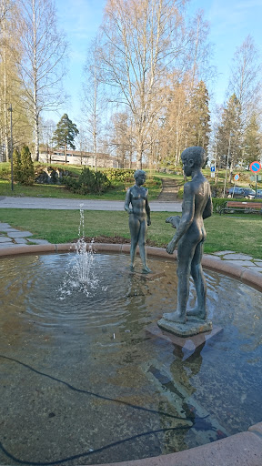 Two Children in Fountain 