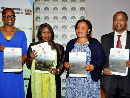 Global restoration council co-chair Wanjira Mathai,environment CS Judi Wakhungu,Environment PS Margaret Mwakima and conservation secretary Gideon Gathaara display forests and Landscape restoration program. Kenya seeks to restore 5.1 million hectares of deforested and degraded forests by 2030 as climate change becomes a reality.