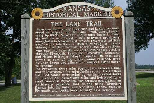 THE LANE TRAIL Near here the towns of Plymouth and Lexington once stood as outposts on the Lane Trail, approximated today by US-75. Named for abolitionist James H. Lane, the trail was established...