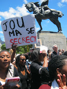 People protest against the secrecy bill outside Parliament