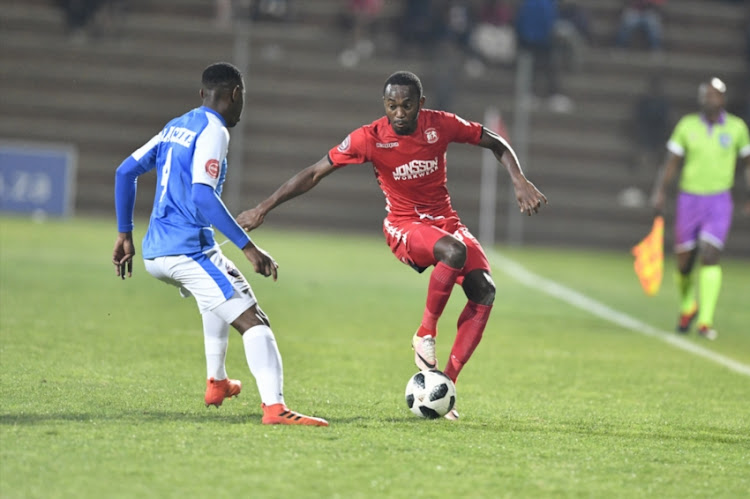 Peter Shalulile of Highlands Park and Zitha Macheke of Chippa United during the Absa Premiership match between Highlands Park and Chippa United at Makhulong Stadium on October 06, 2018 in Johannesburg, South Africa.