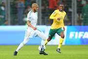 Algeria captain Yacine Brahimi is challenged by Thabang Monare of South Africa during their Fifa Series friendly at the Nelson Mandela Stadium in Algeria.  