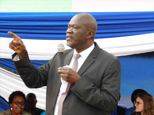 Siaya governor Cornell Rasanga addressing residents of Kadenge during the commissioning of the Yala swamp survey on Wednesday.Photo Lameck Baraza