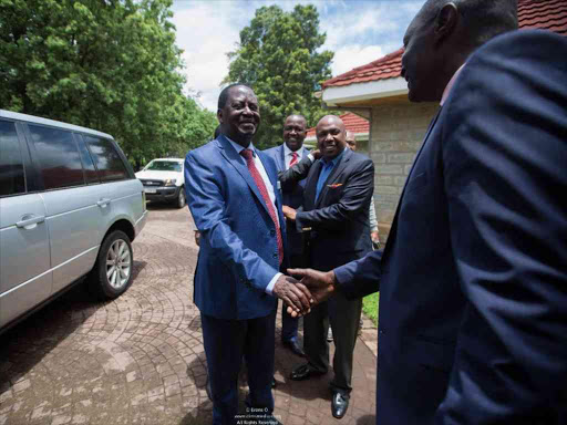 Opposition leader Raila Odinga is welcomed to former President Daniel arap Moi's Kabarak home by politicians including Tiaty MP William William Kamket and Baringo Senator Gideon Moi, April 12, 2018. /EVANS OUMA