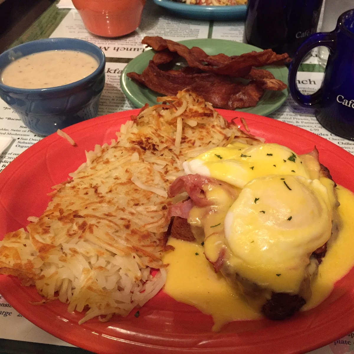 GF Traditional Eggs Benedict which comes with 2 perfect eggs, thinly-sliced deli ham, cheese and a huge scoop of hash browns (you can add gf sausage gravy). Everything was piping hot and delish.