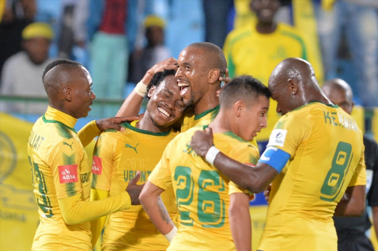 Percy Tau of Mamelodi Sundowns celebrates his goal with teammates during the Absa Premiership match between Mamelodi Sundowns and Chippa United at Loftus Versfeld Stadium on April 04, 2018 in Pretoria, South Africa.