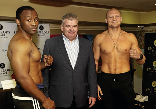 Thabiso Mchunu and Ricards Bolotniks from Latvia, right, ahead of the boxers' 10-rounder at Emperors Palace, Ekurhuleni, tomorrow night.