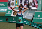 Comrades Marathon women's winner Ann Ashworth crosses the finish line at Moses Mabhida Stadium in Durban on June 10 2018.