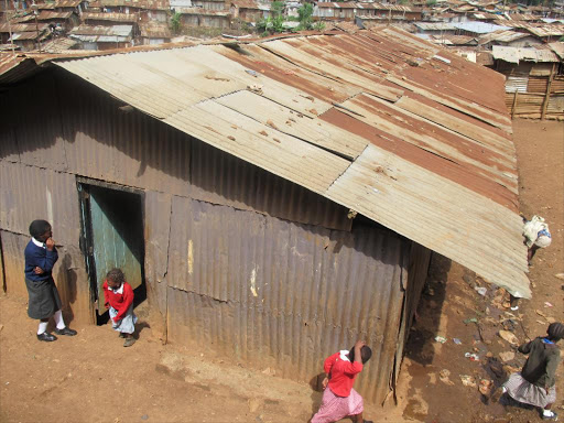 Cildren outside a children's home in Kibera. /FILE