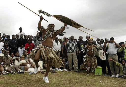 Jacob Zuma gets in the mood during a previous marriage ceremony.