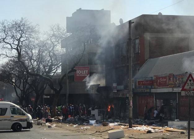 Some buildings in Pretoria were looted and set on fire on Wednesday morning.