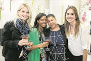 SIPPING PRETTY: Jeanri-Tine van Zyl, Tshepang Molisana, Ingrid Jones and Lucille Botha at the  Pongrácz  25th anniversary at De Waterkant’s CAAM Gallery. Pic: Supplied. © Unknown