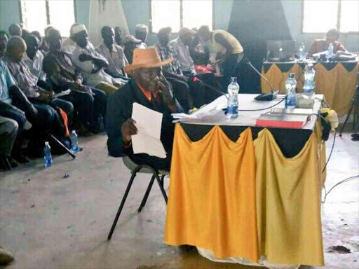 Peter Ngugi, a resident of Mpeketoni in Lamu county, makes his presentation to the Kenya National Commission on Human Rights during a public inquiry on November 10, 2016. /COURTESY