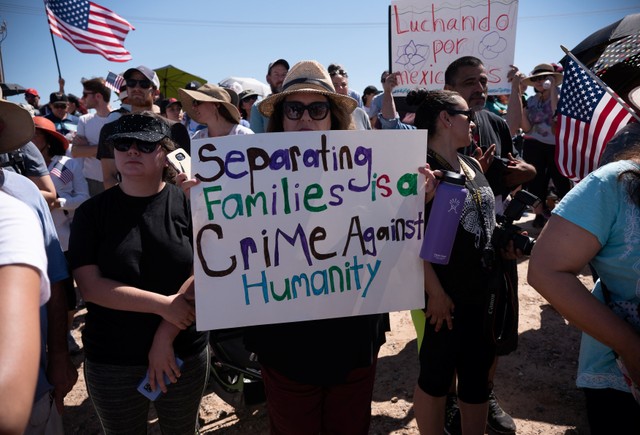 People protest against a recent US immigration policy of separating children from their families outside the Tornillo Tranit Centre, in Tornillo, Texas, on June 17 2018.