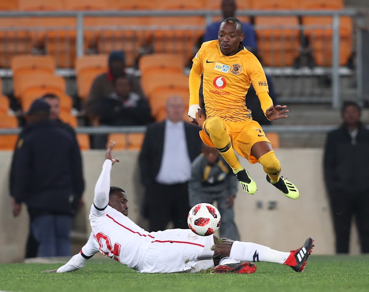 Khama Billiat of Kaizer Chiefs evades tackle from Bangali Keita of Free State Stars during the 2018 MTN8 football match between Kaizer Chiefs and Free State Stars at Soccer City, Johannesburg on 11 August 2018.