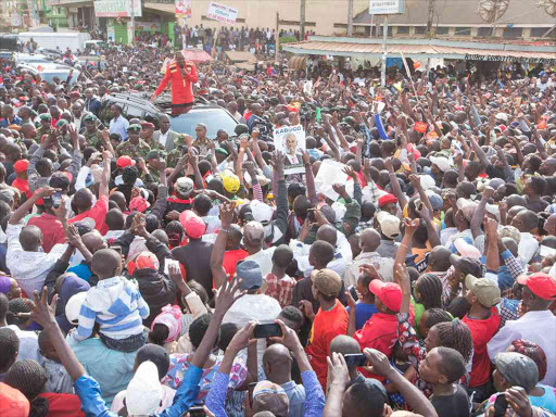 President Uhuru Kenyatta addresses residents of Ruiru town during the Jubilee Party’s tour of Kiambu county on June 17 /PSCU