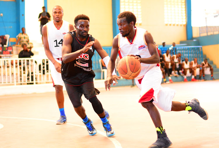 Thunder's Griffin Ligare in action with Equity's Titus Musembi (R) in a past match