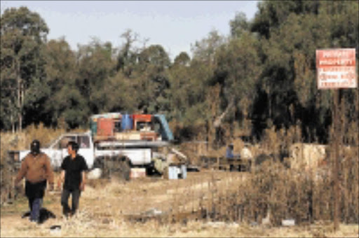 MOVING IN: Ninety-one people have applied for plots on this land in Soweto. Pic. Lucky Nxumalo. 30/07/08. © Sowetan.