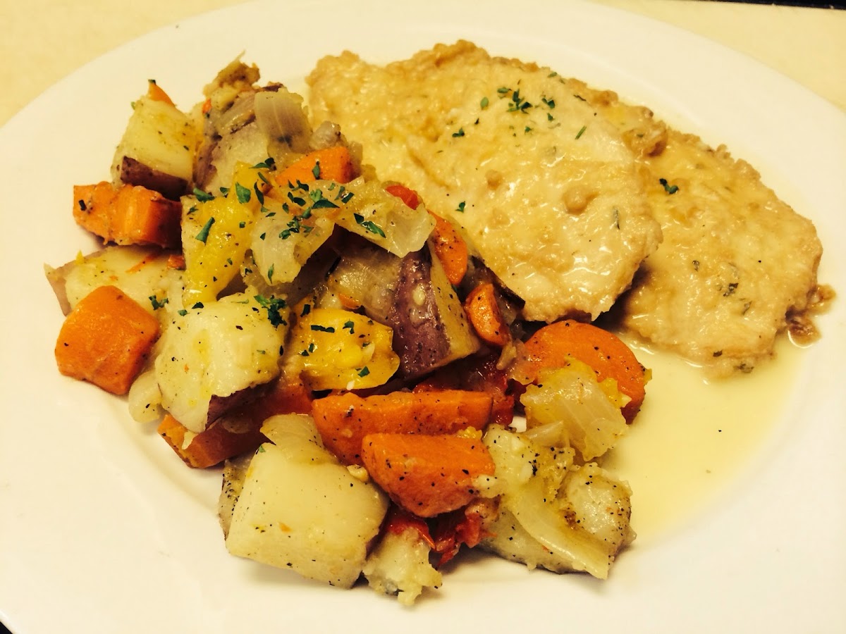 Gluten free  chicken Francese over roasted potatoes and vegetables