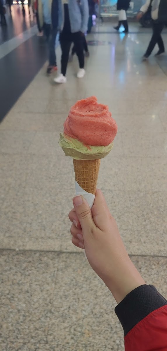 Pistachio and strawberry on a GF cone. From the Termini station location