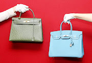 An Hermes Birkin and an Hermes Kelly bag at a pre-auction photo call for Hermes handbags at Bonhams, Knightsbridge, London.