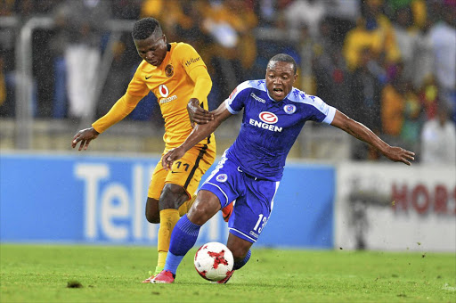 Thuso Phala and Edmore Chirambadare tussle for the ball in an Absa Premiership match last night.