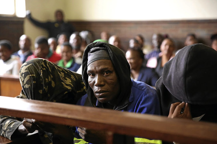 Seven men accused of eating human flesh appeared in the Estcourt Magistrate's Court on Thursday.