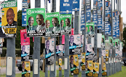 Political parties' election posters jostle for visibility on the streetlights post national and provincial elections on May 29. 