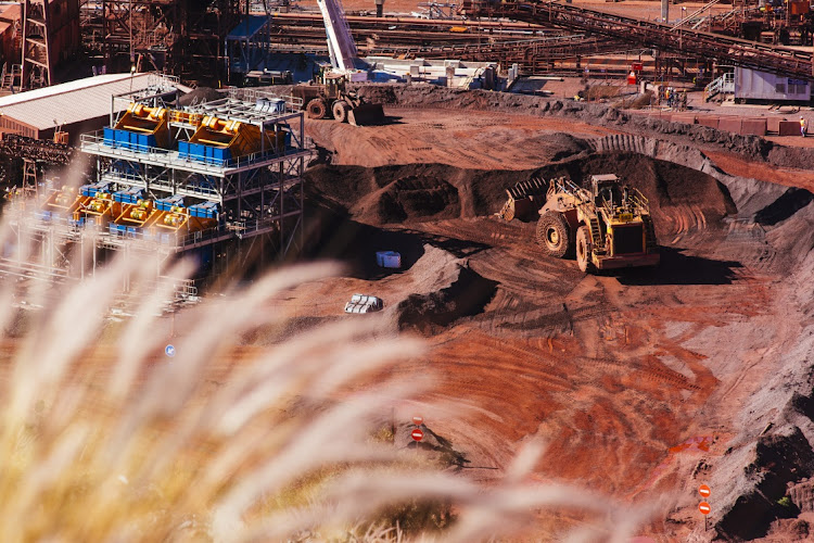 Iron ore produced at Kumba's Sishen mine is shipped to global markets. Picture: GETTY IMAGES/WALDO SWIEGERS