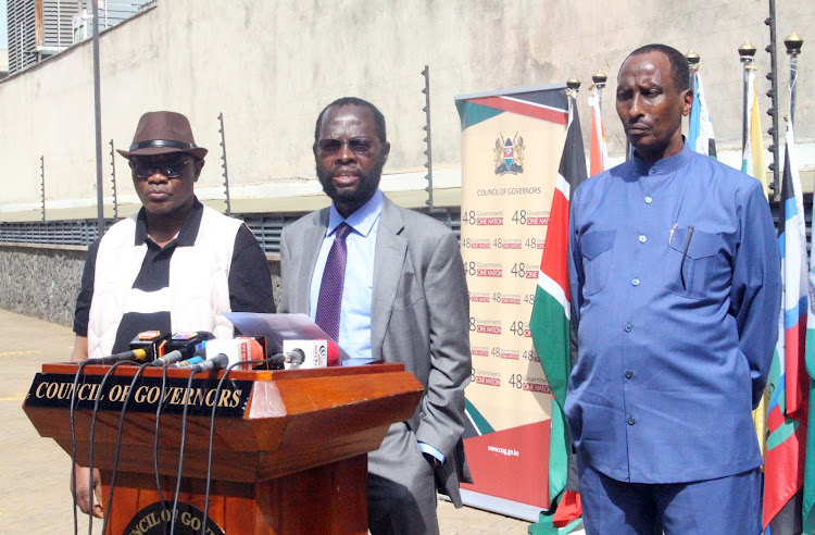 Governors James Ongwae (Kisii), Anyang' Nyong'o (Kisumu) and Abdi Mohamud (Wajir) address journalists outside Council of Governors offices at Oracle, Westlands on Friday, April 1.