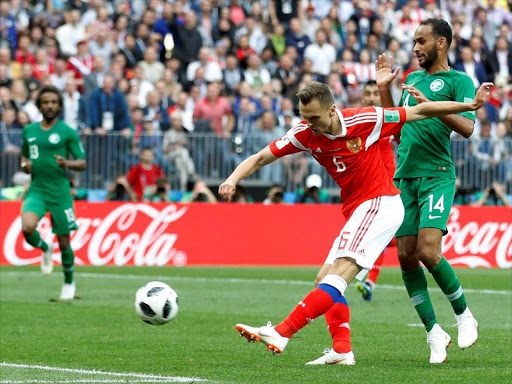 Russia's Denis Cheryshev scores their second goal at the World Cup Group A match against Saudi Arabia at Luzhniki Stadium, Moscow, Russia, June 14, 2018. /REUTERS