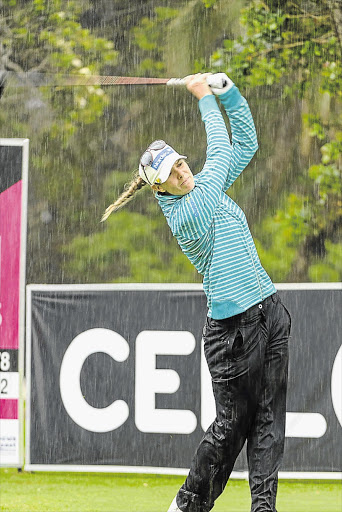 SOAKED: Defending champion Marianne Skarpnord of Norway on her way to a two-over-par score on the first day of the SA Women's Open yesterday