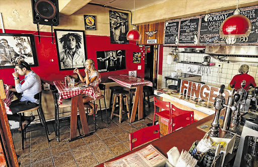 HAND TO MOUTH: At Sticky Fingers in Observatory it's best to tuck in a serviette and use your fingers