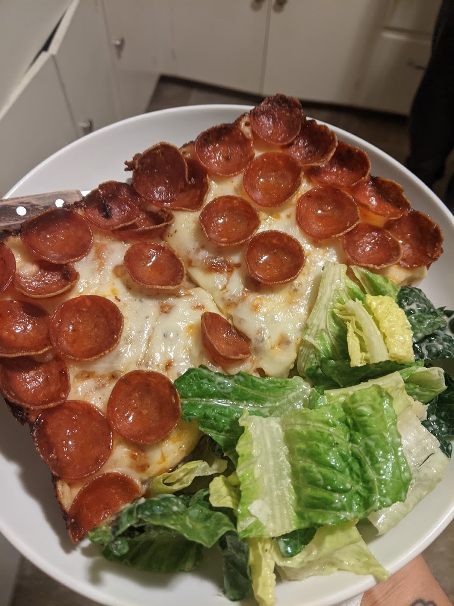 pepperoni pizza and cesar salad