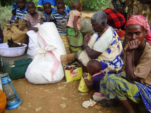 Displaced residents at Mukutani trading centre in Marigat Sub-county of Baringo after their houses were brought to hashes by armed Pokot raiders on June 10 2014. Photo/File