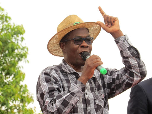 Ugunja MP Opiyo Wandayi addresses residents at Rang'ala Catholic Church in the constituency, May 13, 2018. /LAMECK BARASA