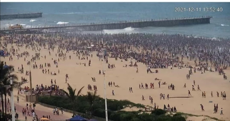 This image shows crowds gathered at a Durban beach on Saturday.