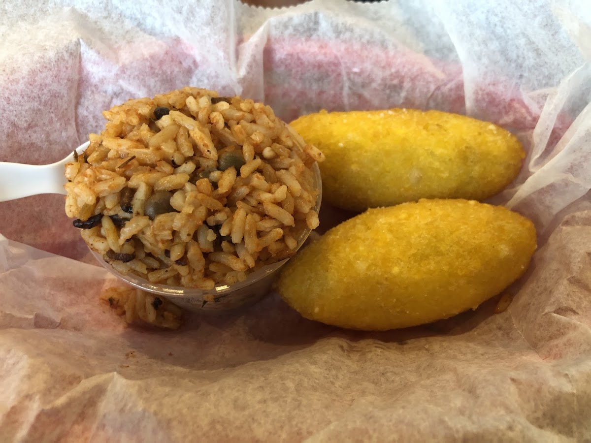 Two empanadas and side of rice
