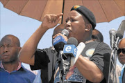 SOLIDARITY: Suspended ANC Youth League leader Julius Malema addresses striking  Impala Platinum miners.