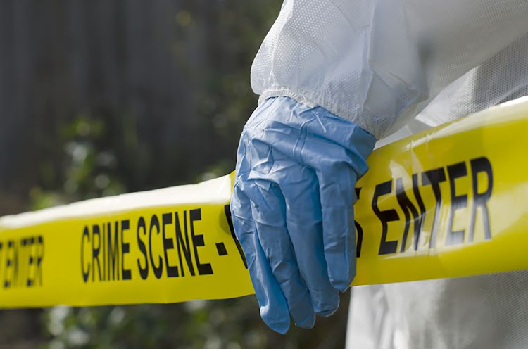 21892616 - forensic investigator working at a crime scen
