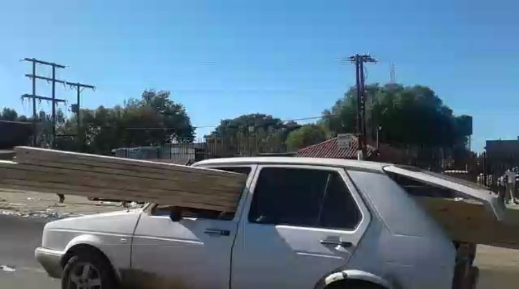 A white Citi Golf was spotted leaving a looted warehouse in Stateng as protests in Mahikeng calling for North West Premier Supra Mahumapelo to step continue.